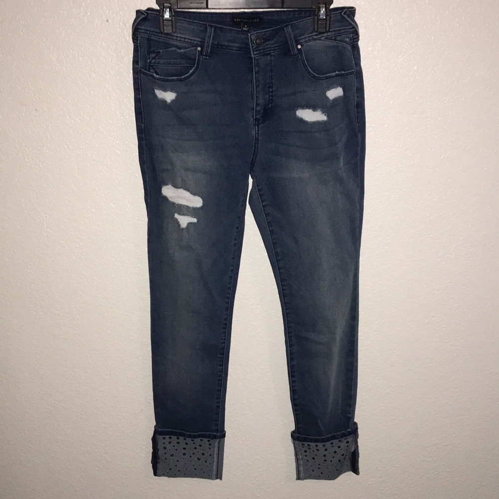 Jeans size 8 with embellished cuffs. Used